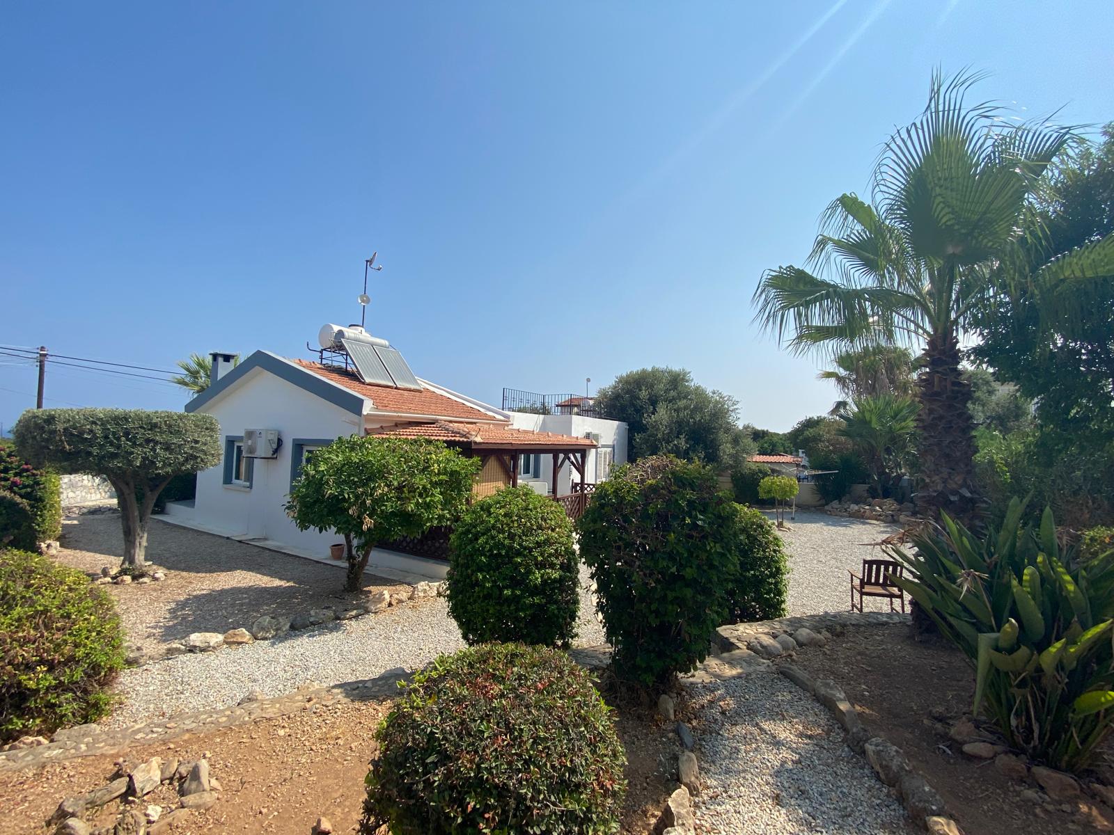 Charming 2 bedroom bungalow with wonderful lush gardens, spacious roof terrace and great sea and mountain view, Tatlisu